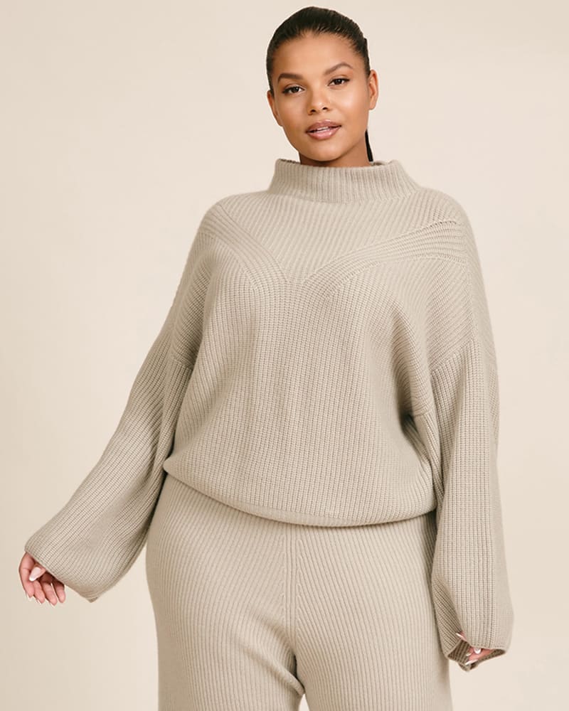 Front of a model wearing a size XL Ribbed Mock Neck Bell Sleeve Sweater in Grey by LAPOINTE. | dia_product_style_image_id:233282